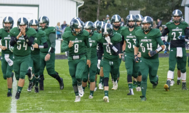 Central Montcalm Holds Off Grant 25-21