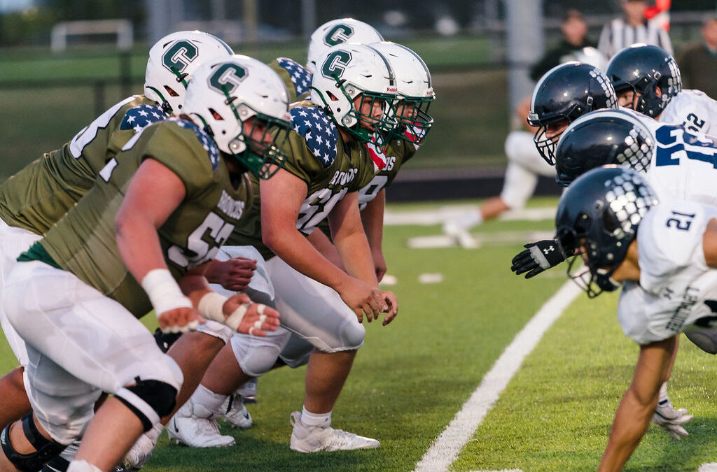 Broncos Stifle Hawks in 42-6 Rout