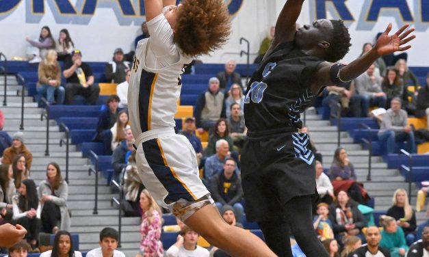 PHOTO GALLERY: Grand Rapids Christian: 60, East Grand Rapids: 48