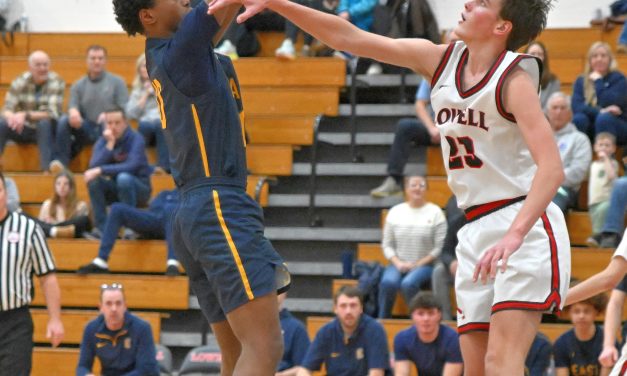 PHOTO GALLERY: Boys | Lowell, East Grand Rapids