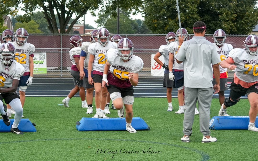 Grandville faces gauntlet of football schedule with workmanlike attitude; Cass Tech visits this week